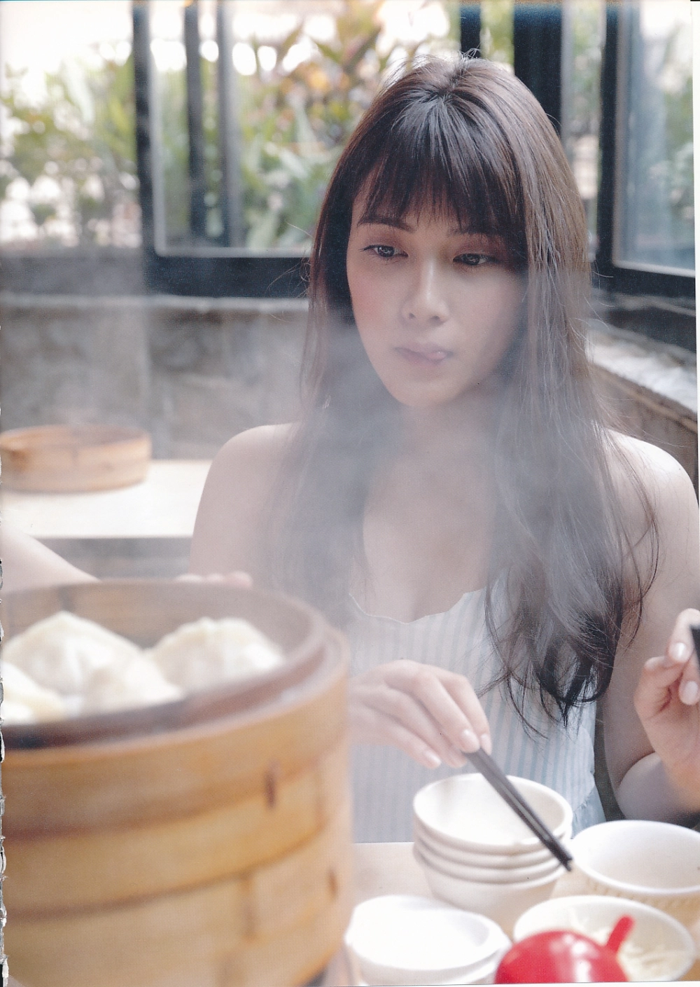 Her seductive gaze reveals the fierce allure of Anna Iriyama
