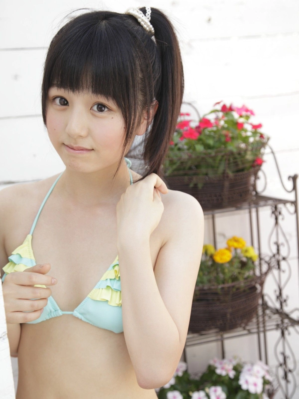 Kurita radiates a confident, sophisticated allure