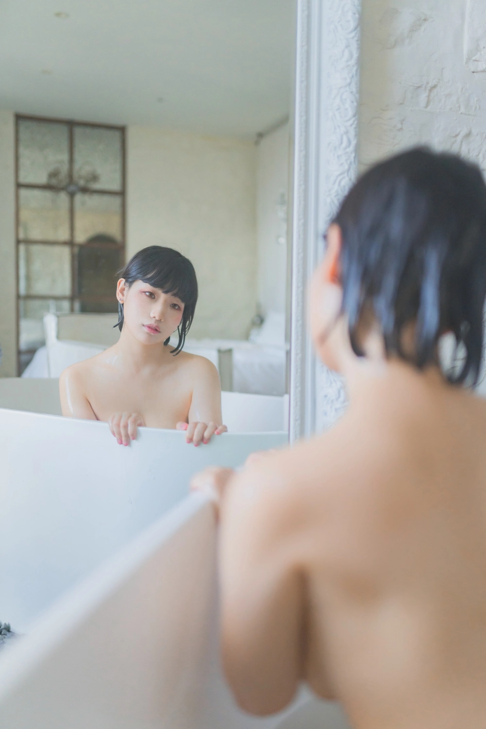 Discover the charm of Mimmi in this photo