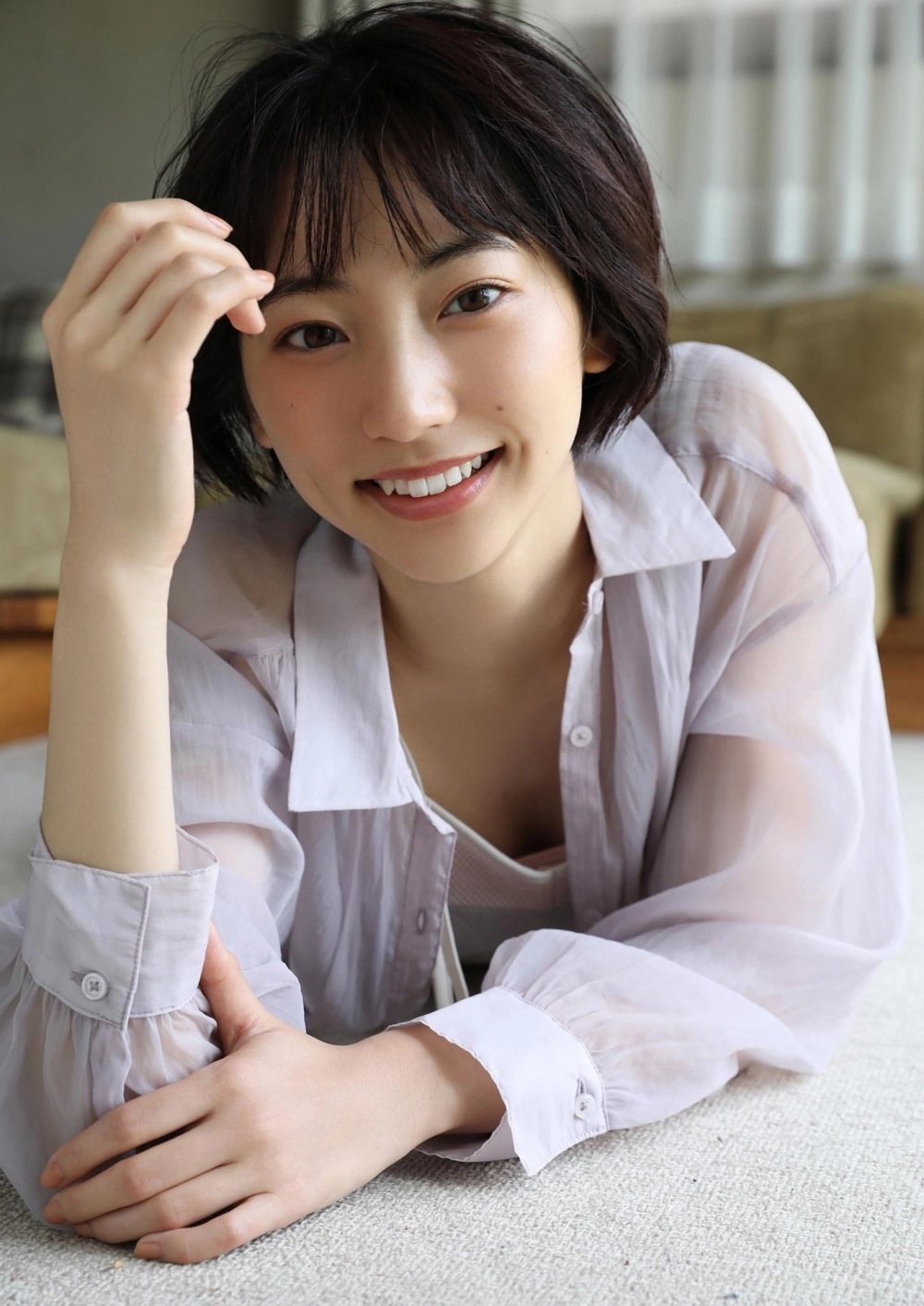 Her gaze ignites the screen featuring Rena Takeda