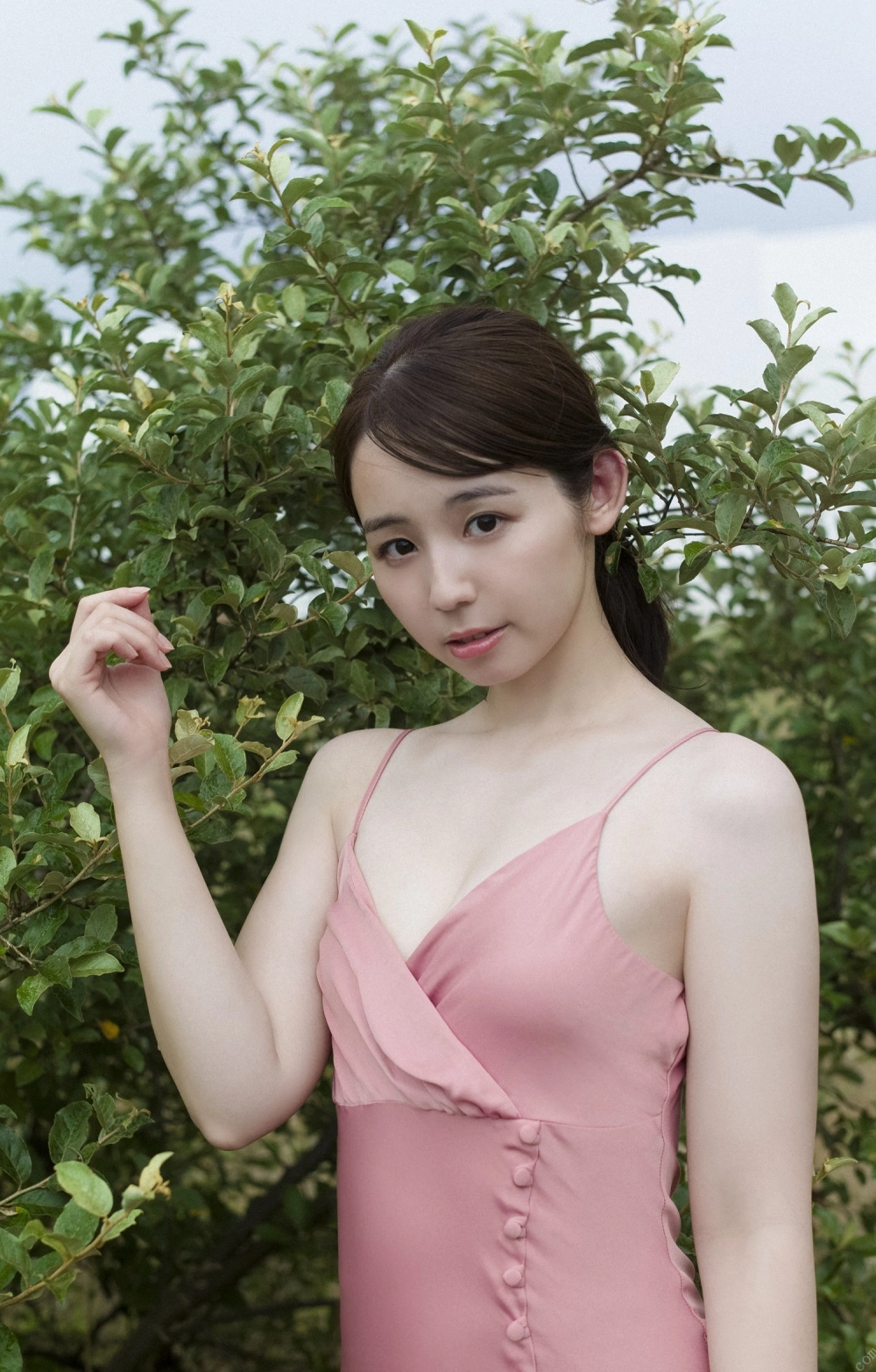 Rina Koike radiates a powerful feminine sophistication
