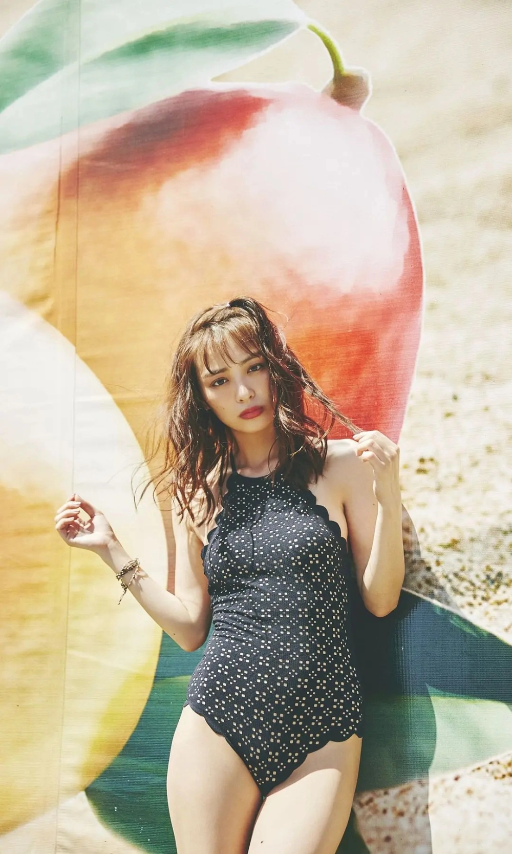 Her seductive gaze reveals the fierce allure of Rio Uchida