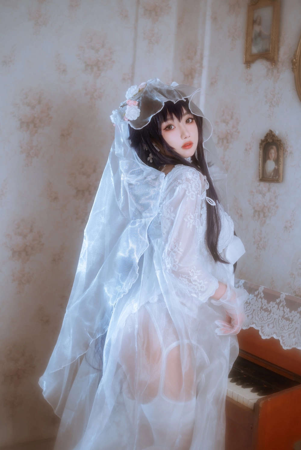 Tao Nuan Jiang in a classic white gown