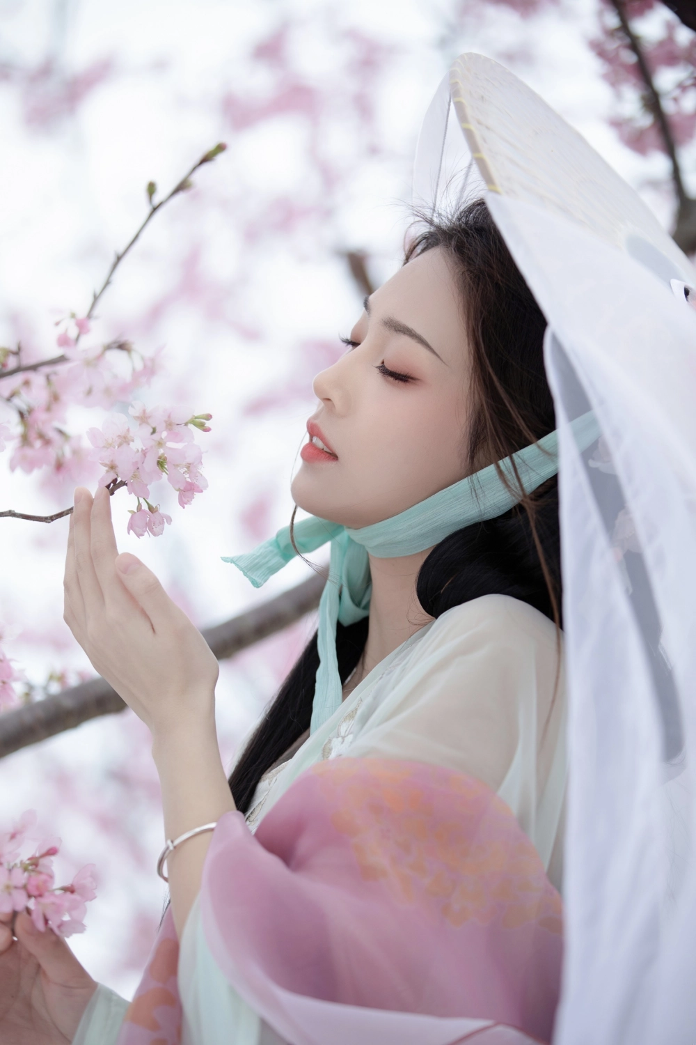 Zhizhi Qi embodying timeless beauty