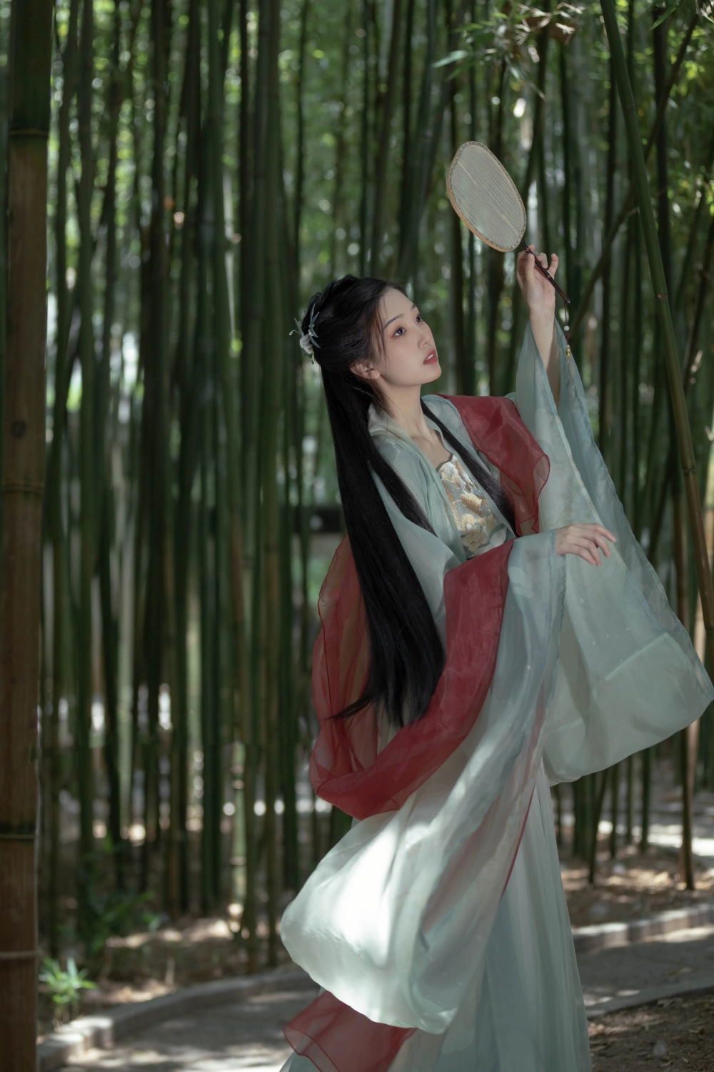 Zhizhi Qi's serene and thoughtful expression