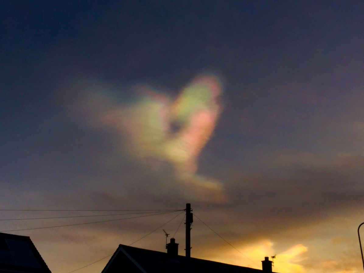 A stunning display of nacreous clouds with vibrant, iridescent colors