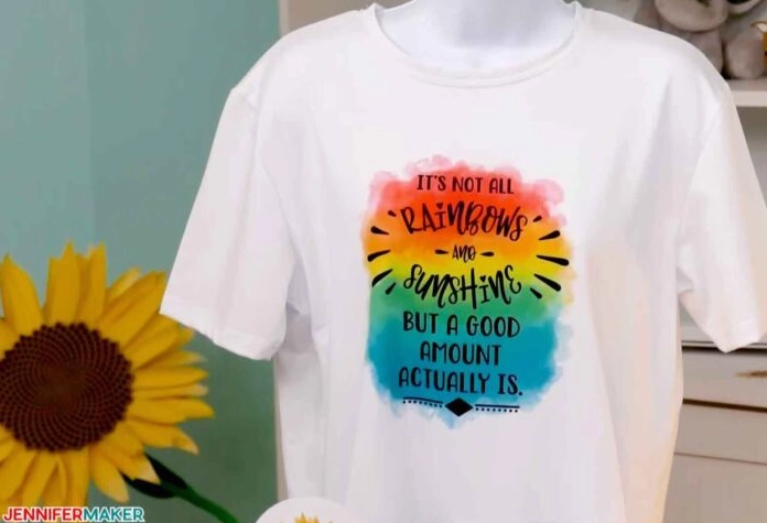 Dye sublimation shirt with a vibrant rainbow design and inspirational text
