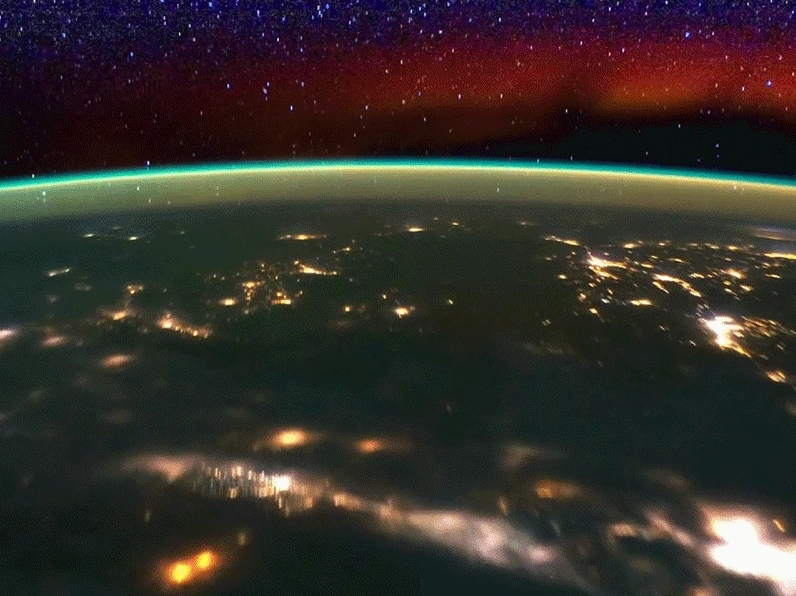 Glowing bands of light over Earth at night