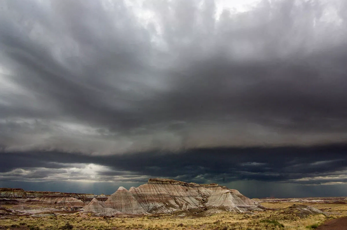 Rainclouds gathering over a desert landscape during the monsoon season