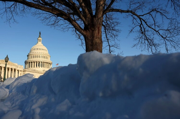Snow covers the U.S. Capitol building in Washington, D.C. during a winter storm