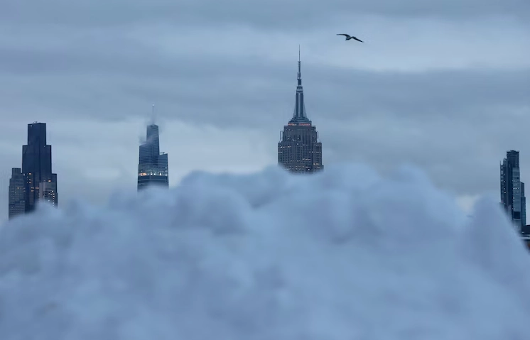 Snowbank in Hoboken, New Jersey, with the New York City skyline in the background
