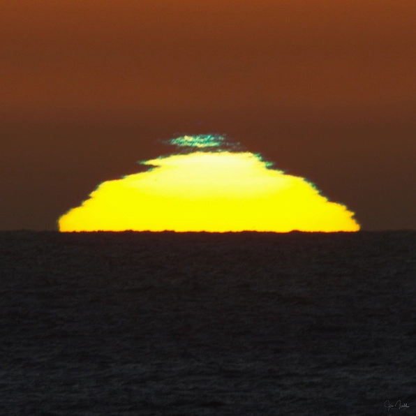 Stages of a green flash captured near Santa Cruz, California.